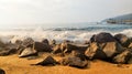 The waves crashing against the rocks on the beach in the morning Royalty Free Stock Photo