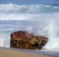 Waves Crashing Against Wreck