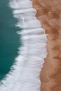 Waves Crashing on Beach Aerial View Vertical Image