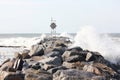 Waves crashing on jetty rocks