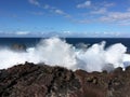 Waves crashing onto the rocks.