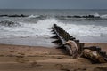 Waves crashing onto tidal defences on Aberdeen city beach on a cloudy day, Scotland, United Kingdom Royalty Free Stock Photo