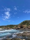 Waves crashing over fascinating rock pools along Australias south coast Royalty Free Stock Photo