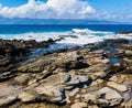 Waves Crashing Over Lava on Makaluapuna Point Royalty Free Stock Photo