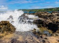 Waves Crashing Over Lava on Makaluapuna Point Royalty Free Stock Photo