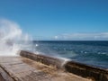Waves crashing over the Malecon sea wall in Havana Royalty Free Stock Photo