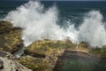 Waves crashing over the railing to the Bogie Hole Royalty Free Stock Photo