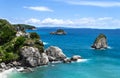 Waves crashing over rock formation sea landscape Royalty Free Stock Photo