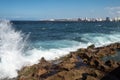 Waves crashing over the sea wall in Havana Royalty Free Stock Photo