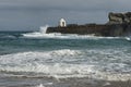 Waves crashing the Pier at Portreath, Cornwall UK