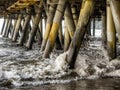 Waves crashing the pillars under the Santa Monica Pier - Santa Monica, Los Angeles, LA, California, CA