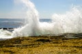 Waves crashing on rocks