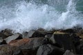 Waves crashing on the rocks at the beach Royalty Free Stock Photo