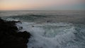 Waves crashing on a rocky coast.