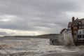 Waves crashing into the sea defences in Sandsend, North Yorkshire Royalty Free Stock Photo