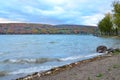 Waves crashing on the shore of Canandaigua Lake in Autumn Royalty Free Stock Photo