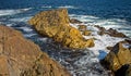 Waves Crashing On A Tiny Rock Island Royalty Free Stock Photo