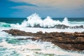 Waves crashing wildly on the rocky shore at Storms River Mouth, South Africa Royalty Free Stock Photo