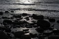 Waves crushing on the rocks at the beach on the sea coast at Jomfruland Island in Norway, Skagerrak