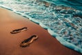 Waves erasing footprints in beach sand, natures cycle photo Royalty Free Stock Photo