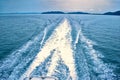 Waves from a ferry in the ocean Royalty Free Stock Photo