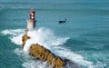 Waves, Fishing boat and lighthouse in the Bay of Pasaia, Euskadi Royalty Free Stock Photo