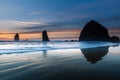 Waves in front of Cannon beach haystack at blue hour Royalty Free Stock Photo