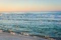 Waves in the Gulf of Mexico at sunrise, in Panama City Beach, Florida Royalty Free Stock Photo