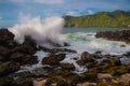 Waves hard crashing coral Royalty Free Stock Photo