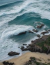 the waves hit the rocks on the shore Royalty Free Stock Photo