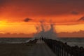 Waves hits the pier at nr. Vorupoer at the North Sea Coast in Denmark