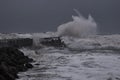 waves hitting against the pier during storm in Nr. Vorupoer on the North Sea coast Royalty Free Stock Photo