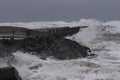 waves hitting against the pier during storm in Nr. Vorupoer on the North Sea coast