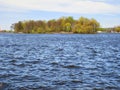 Waves on lake in fine spring weather