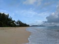 Waves lap on shore of Waimanalo Beach Royalty Free Stock Photo