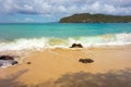 Waves meeting a pristine beach in the windward islands Royalty Free Stock Photo