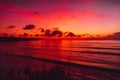 Waves in ocean and bright sunset in Bali. Ocean with sunset colors Royalty Free Stock Photo