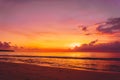 Waves in ocean and warm bright sunset in Bali. Ocean with sunset colors Royalty Free Stock Photo