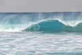 Translucent waves curl onto Boca Beach