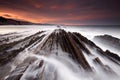 Waves over the flysch at sunset