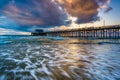 Waves in the Pacific Ocean and the Newport Pier Royalty Free Stock Photo