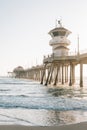 Waves in the Pacific Ocean and the pier in Huntington Beach, Orange County, California Royalty Free Stock Photo