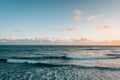 Waves in the Pacific Ocean at sunset, at Swami\'s Beach, in Encinitas, California Royalty Free Stock Photo