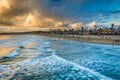 Waves in the Pacific Ocean and view of the beach at sunset Royalty Free Stock Photo