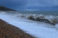 Waves on a pebble beach