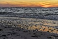 rinsed colored pebbles by the sea waves Royalty Free Stock Photo