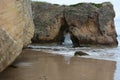 Waves pounding entrance in rocks