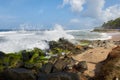 Waves pounding a rock strewn beach