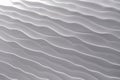 waves or ripples left in the sand by the water, sand marks by the water, white sand texture sculpted by the tide, wavy background Royalty Free Stock Photo