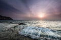 Waves, rock and sun Royalty Free Stock Photo